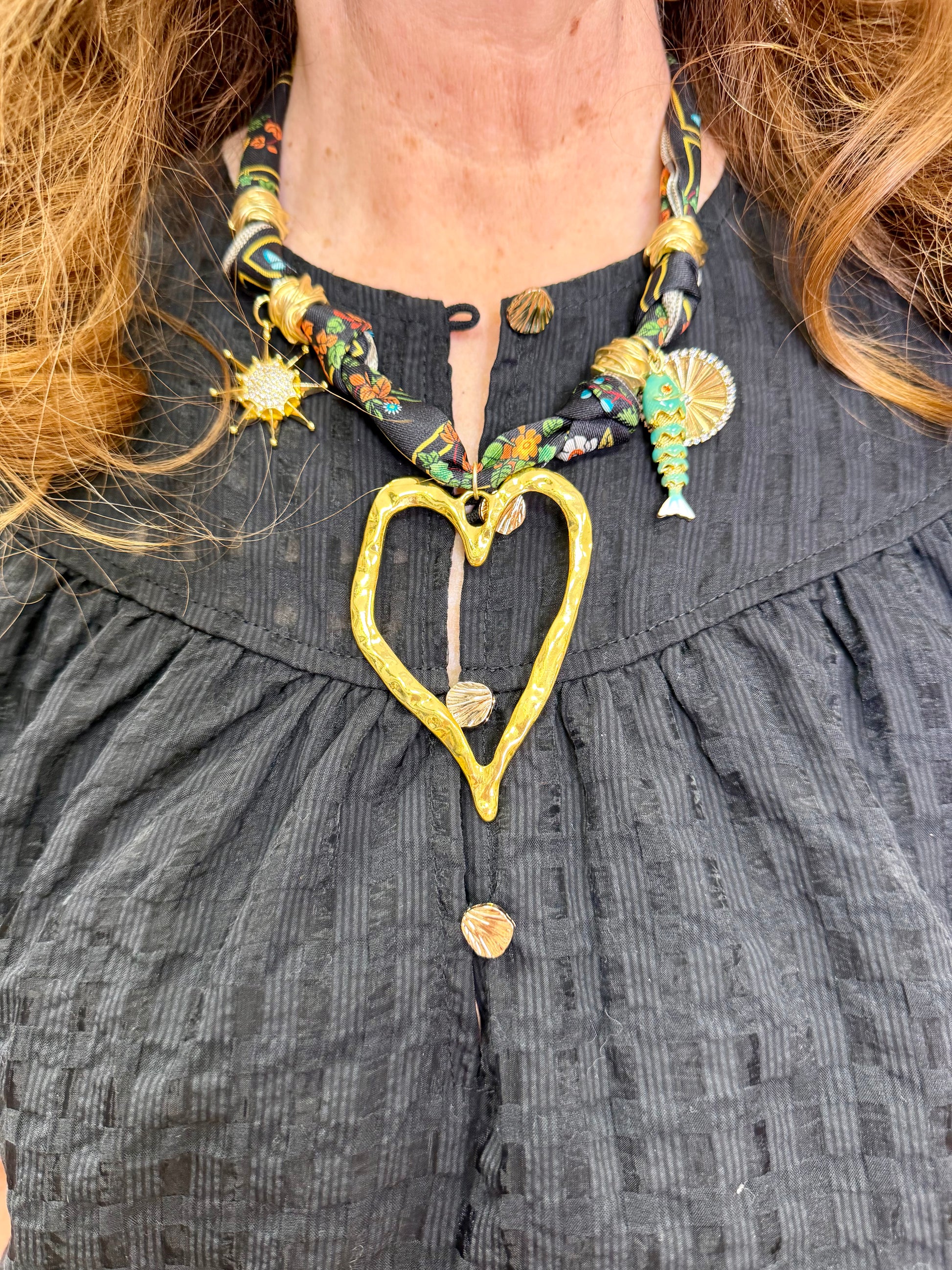 Charms 18K Gold Plated
Scarf 100% Polyester
A bold necklace to zhush up any fit! Charms are IN & this necklace is no exception!